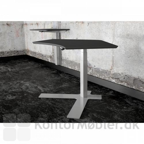 Antracitgrå linoleumsplade på enkeltsøjlet hæve sænke bord- i baggrunden vægmonteret