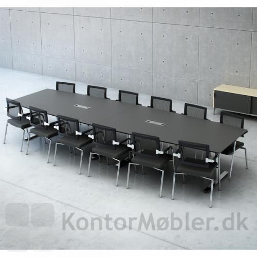 Stort to-delt konferencebord med overflade i antracitgrå laminat og forkromet stel