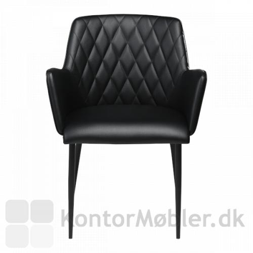 Rombo restaurantstol i Vintage kunstlæder. Stolen er fremstillet af Dan-Form i Skandinavisk stil. Her ses stolen i en flot klassisk sort.
