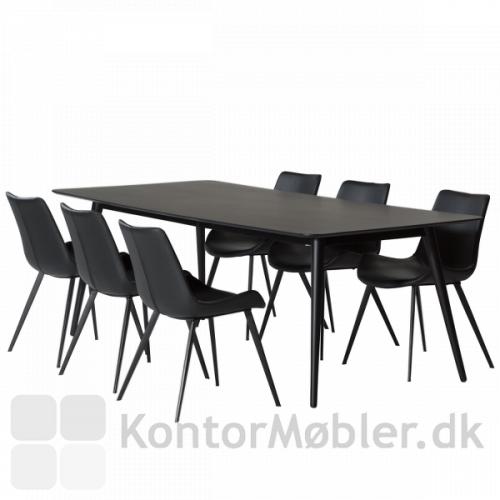Pheno sortbejdset mødebord rummer plads til 6-8 personer og er også perfekt som spisebord.